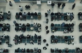 Hospital waiting room crowd (cropped) ChatGPT